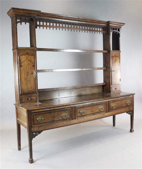 A mid 18th century mahogany banded oak dresser, W.6ft 11in. D.1ft 8in. H.6ft 2in.